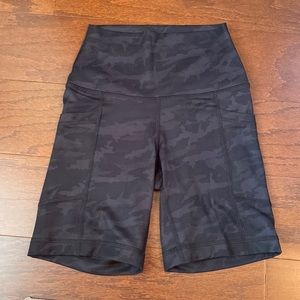 black and dark gray camo biker shorts